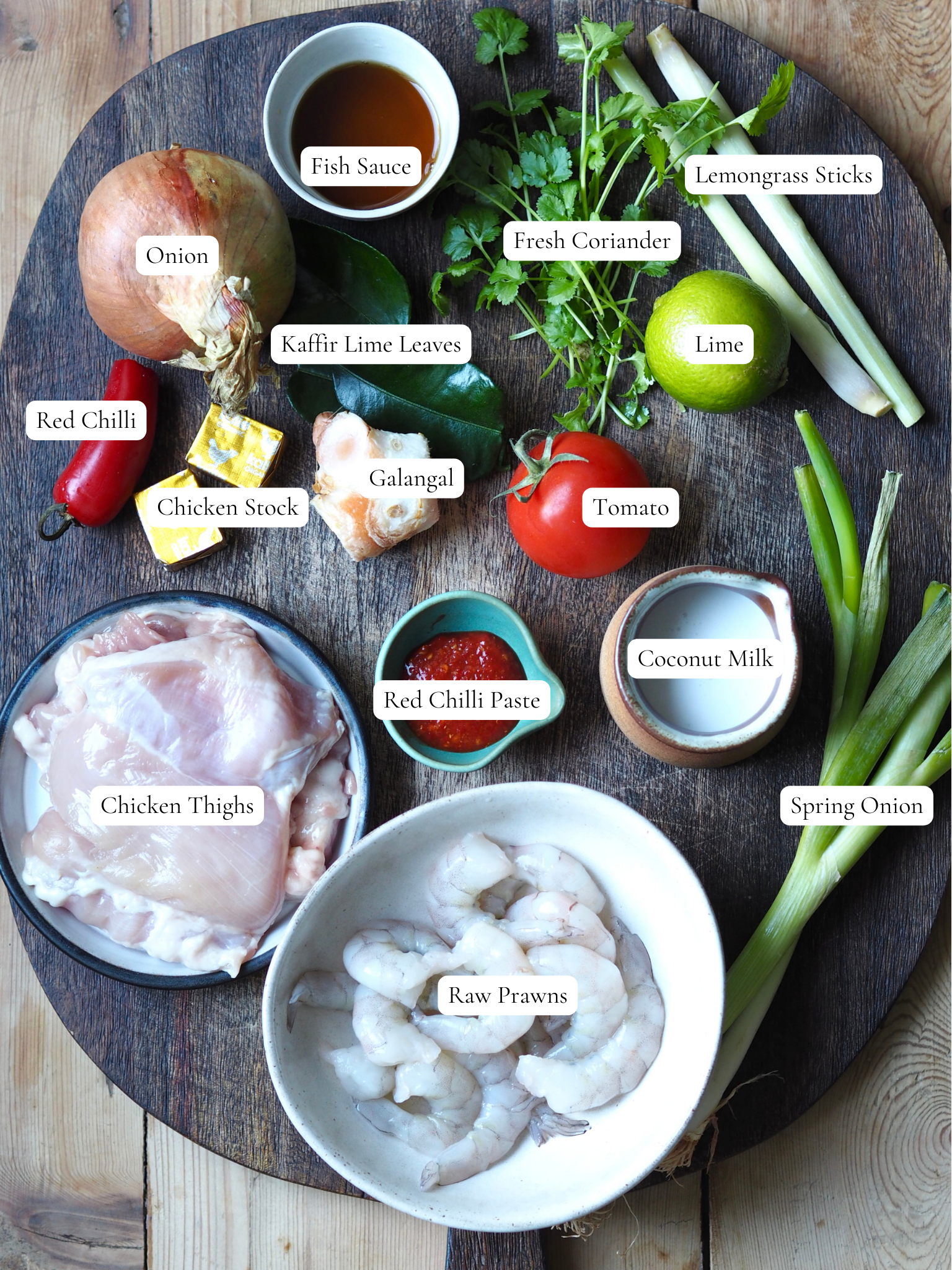 labelled ingredients to make chicken tom yum soup.