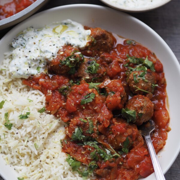 lamb mince meatballs with rice and tomato sauce.