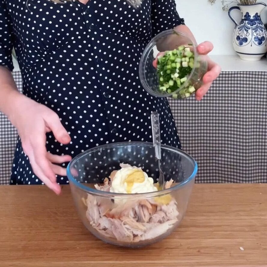 mixing the chicken mayonnaise.