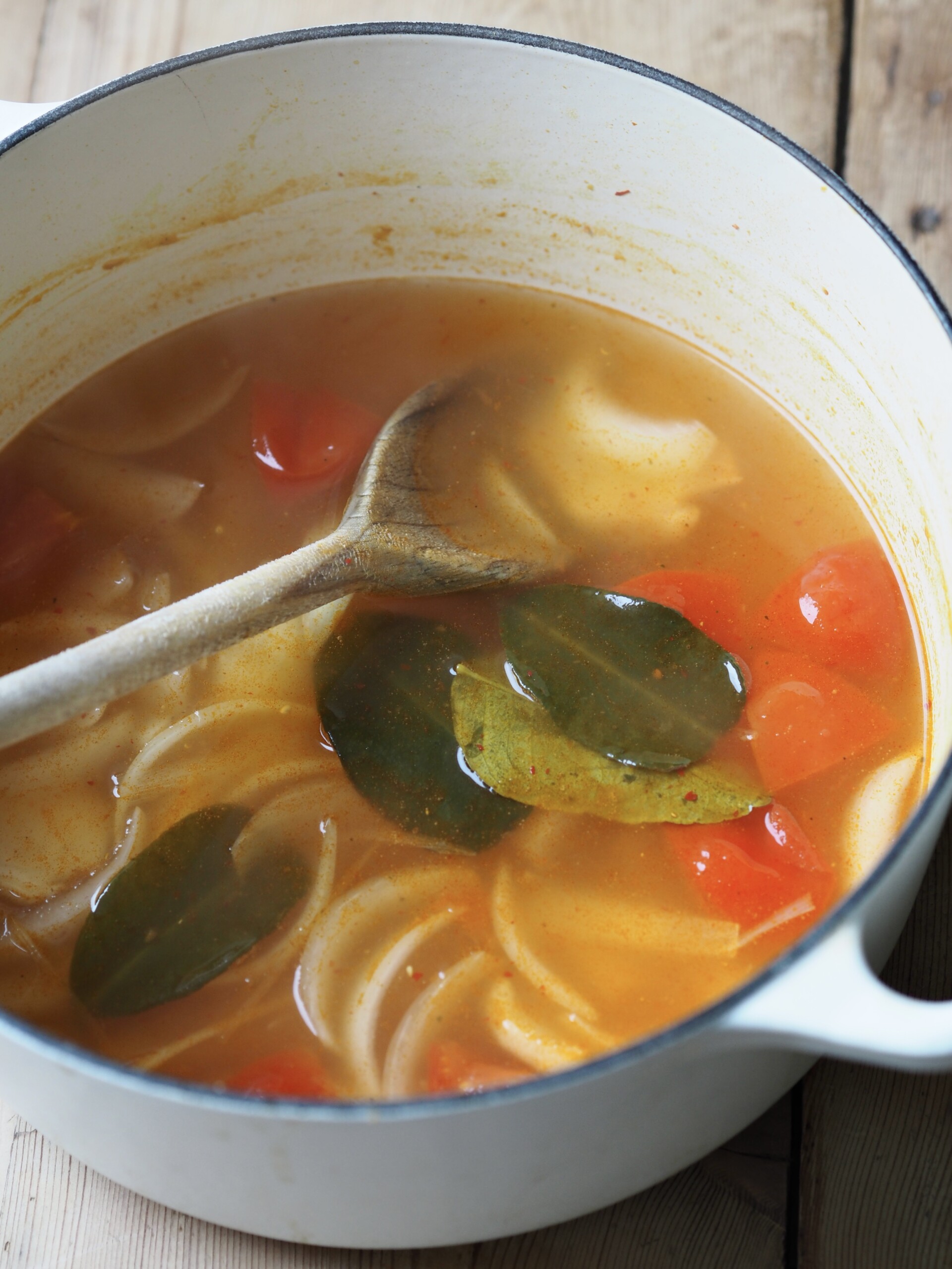 adding chicken and tomatoes.