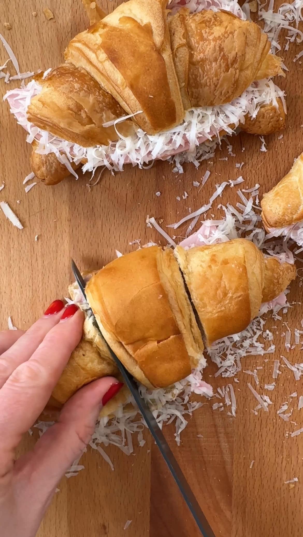 slicing croissants into 3.