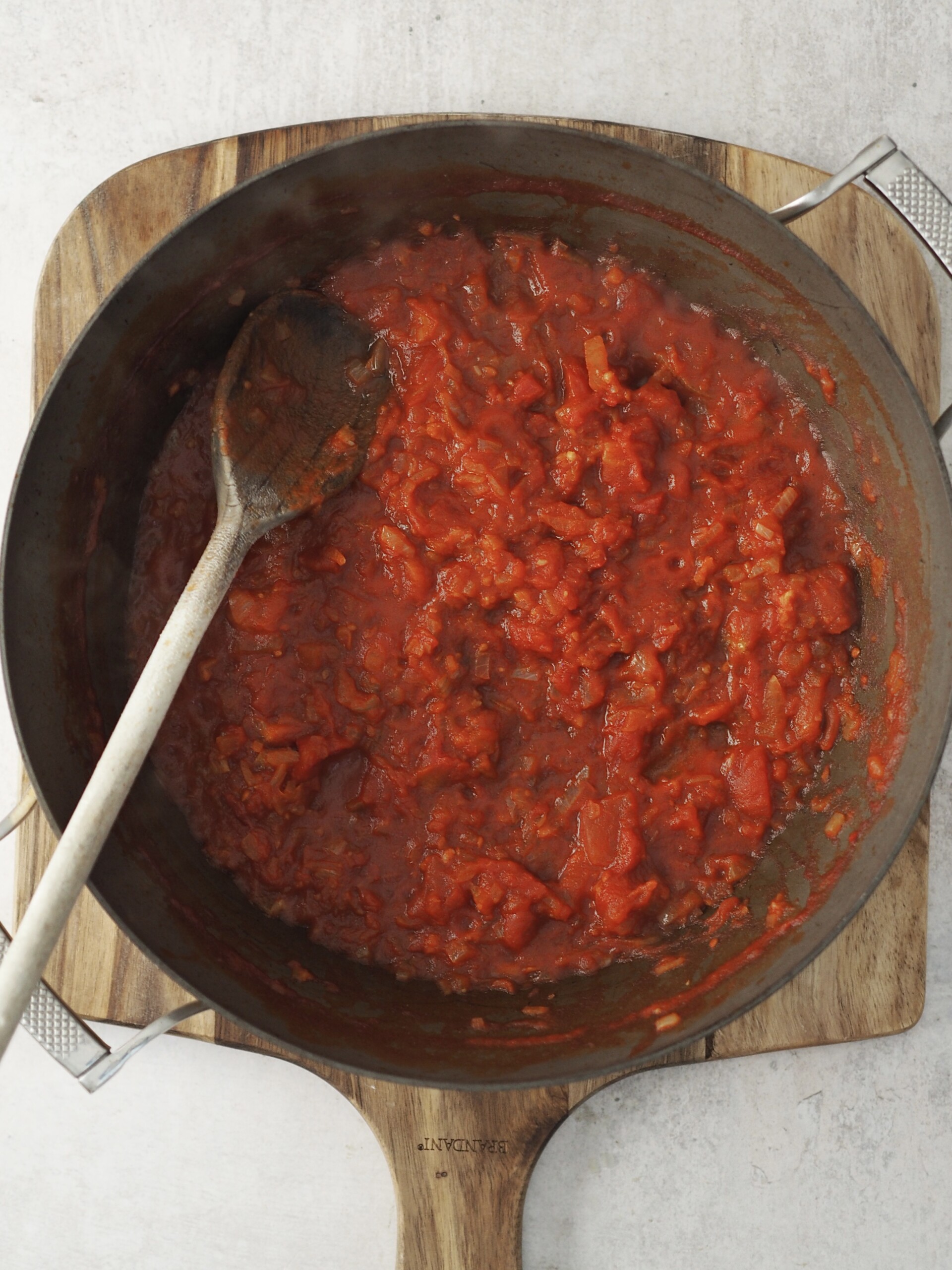 making the tomato sauce.