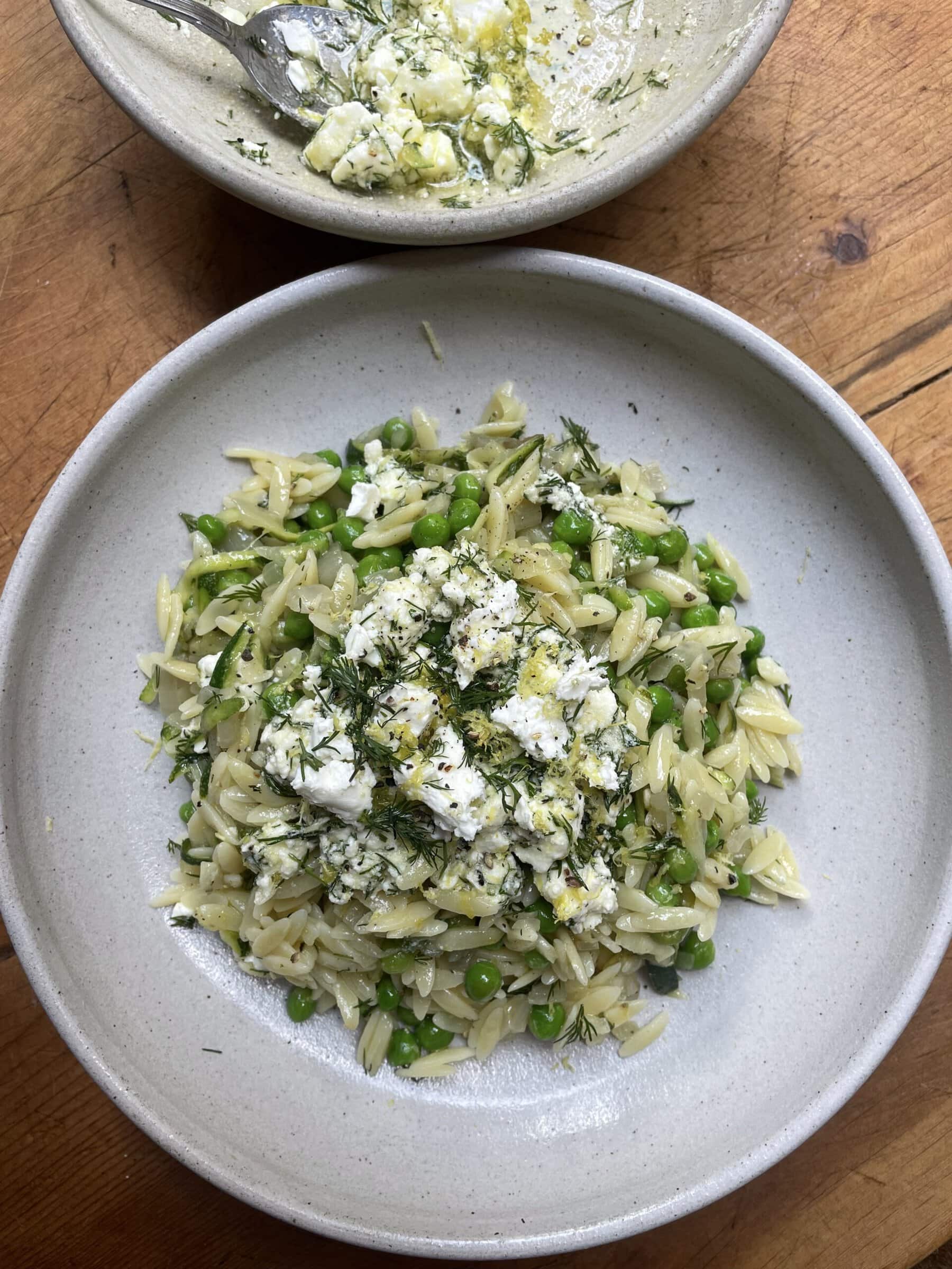 lemon orzo with feta in a grey bowl.