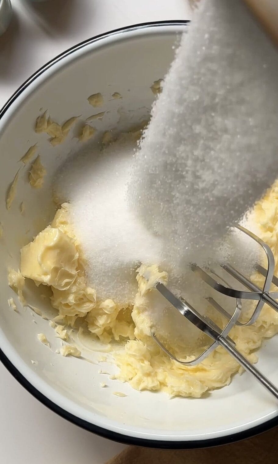 beating butter and sugar.