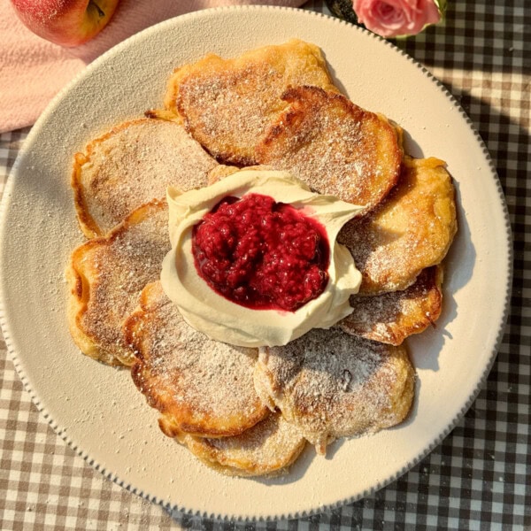 racuchy with cream and raspberry compote.