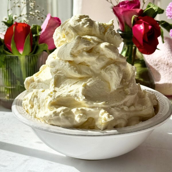 whipped mascarpone cream in bowl.