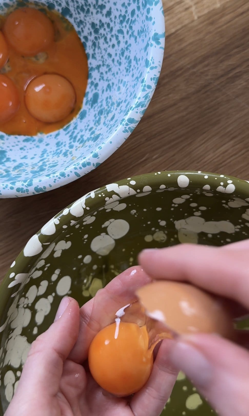 separating egg whites from egg yolks.