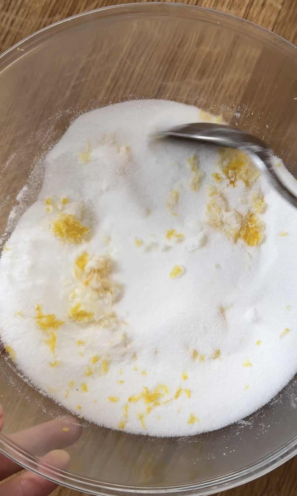 mixing lemon zest and sugar.