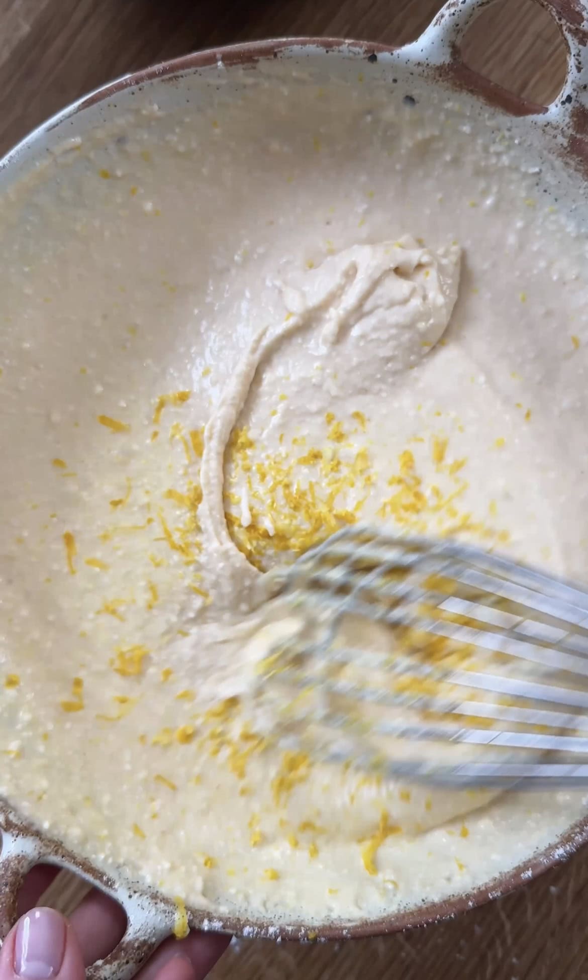 MIXING In lemon zest.