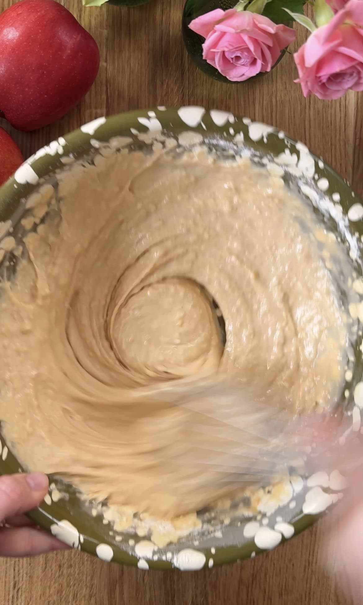 whisking racuchy batter.