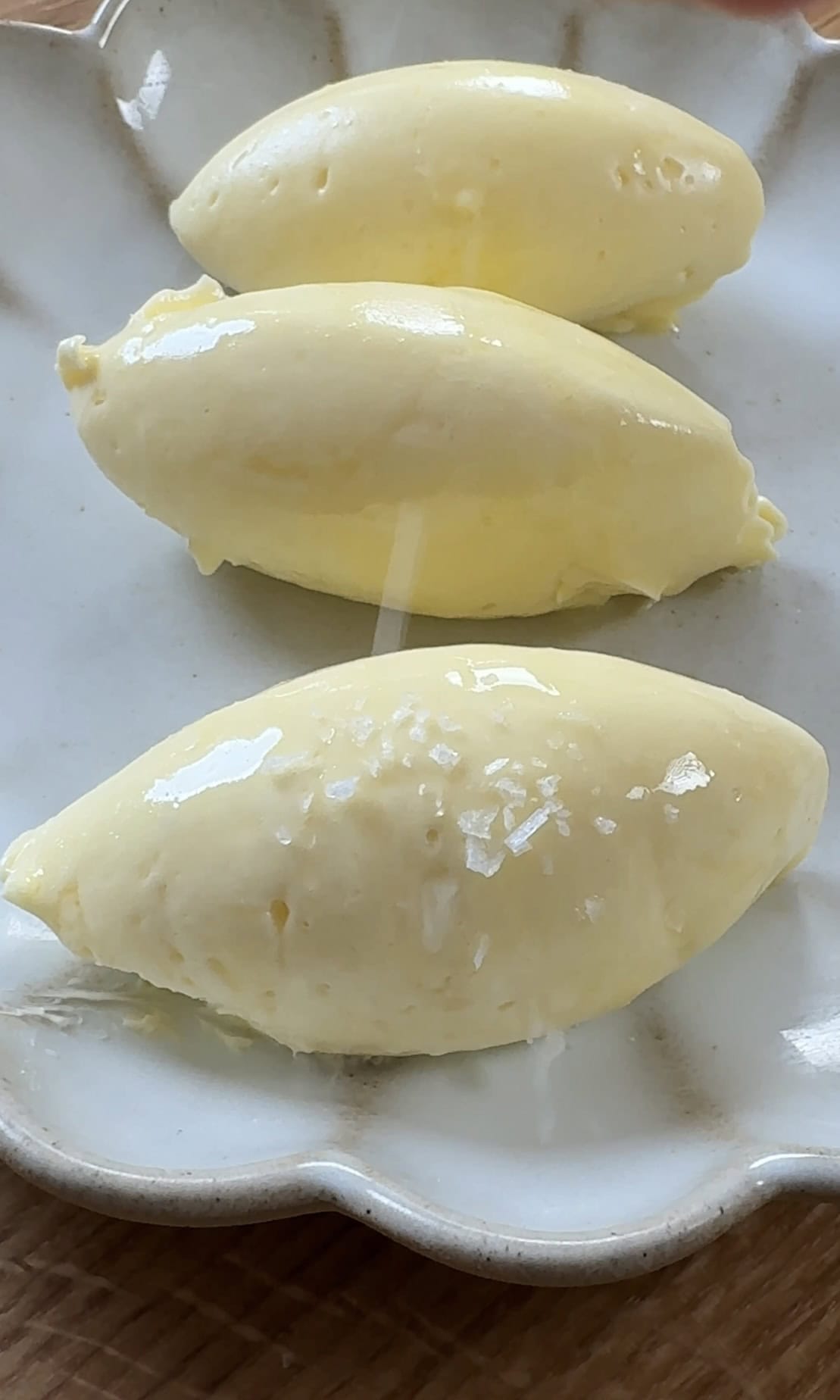 salting the whipped honey butter.