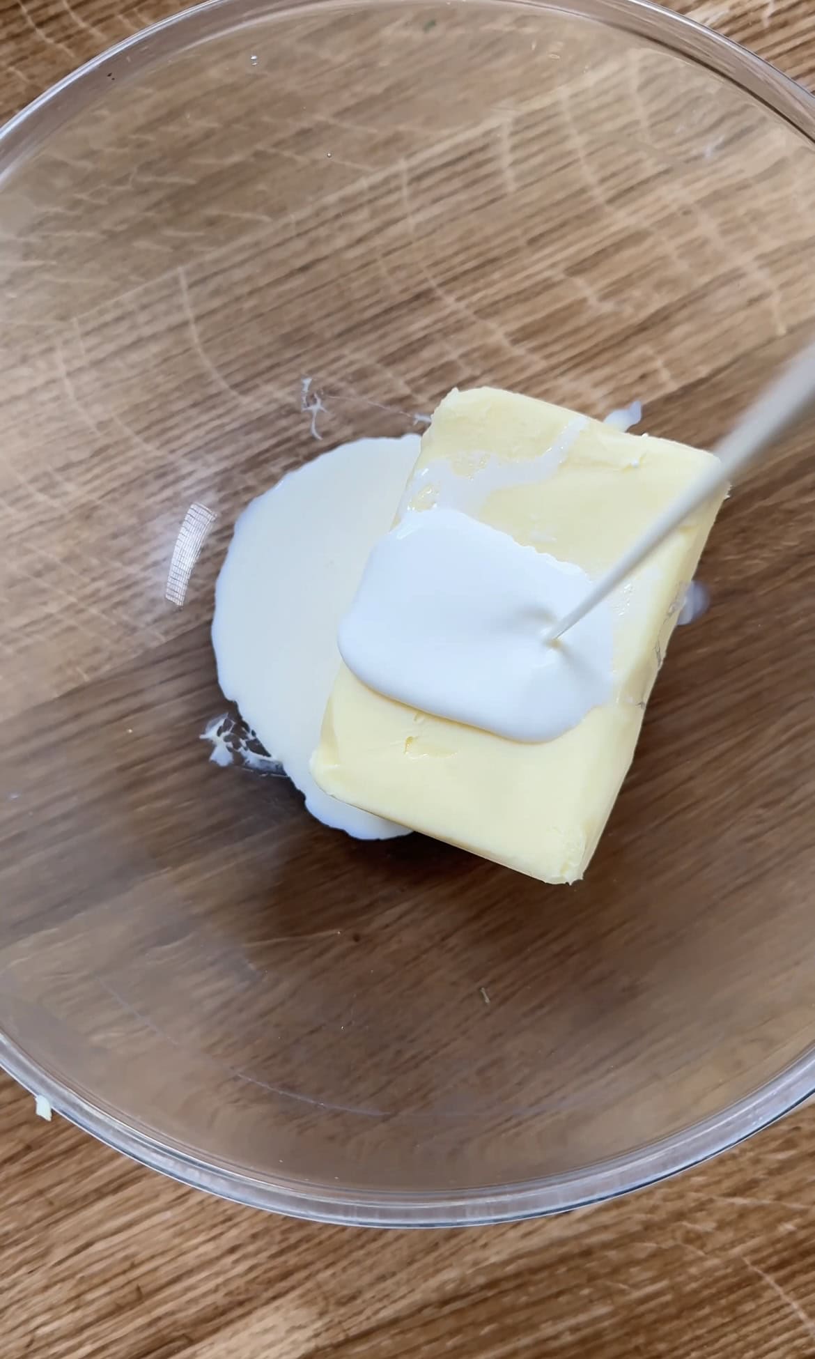 adding cream to butter.