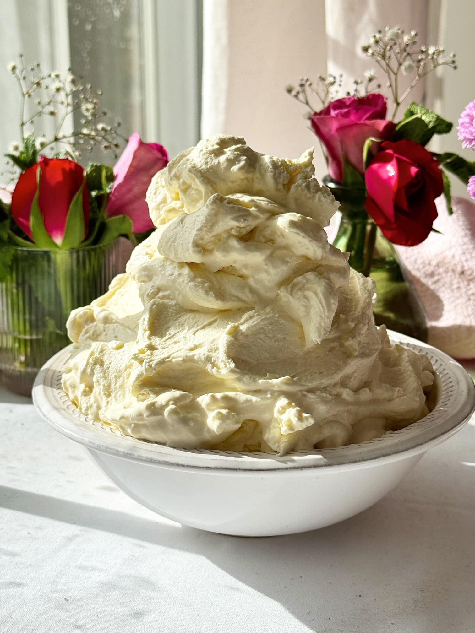 whipped mascarpone cream in bowl.