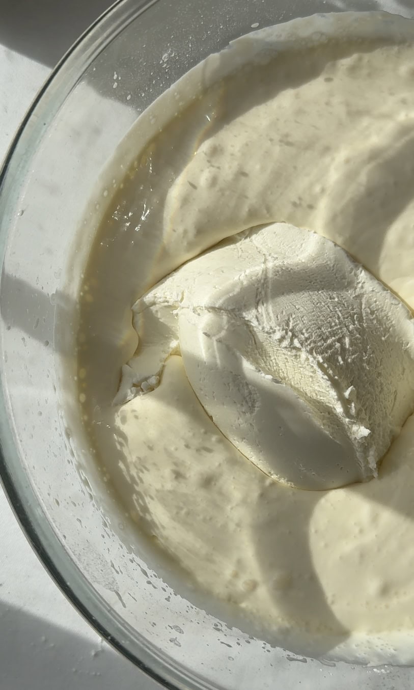 adding mascarpone to double cream.