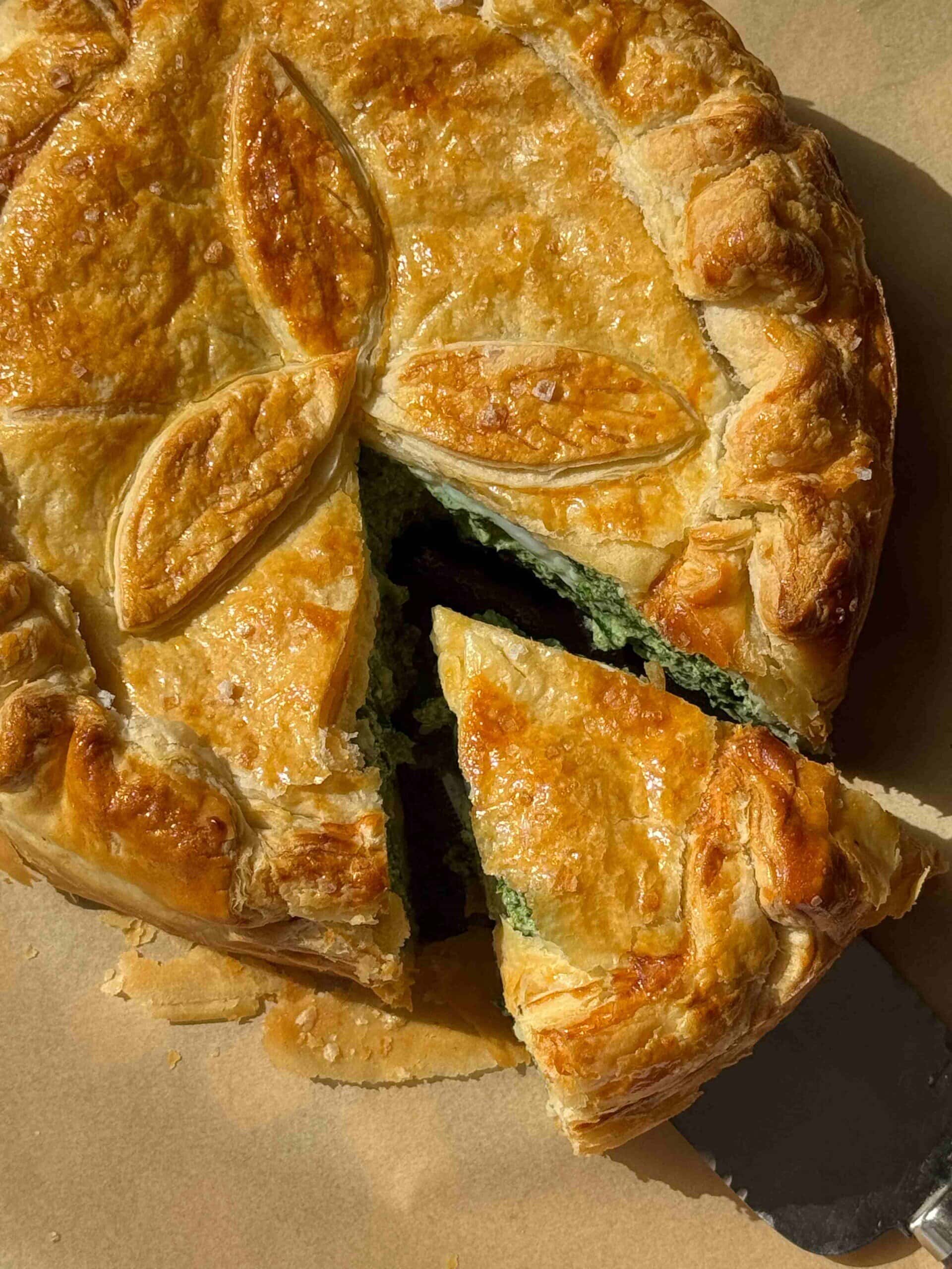 torta pasqualina with a slice removed.