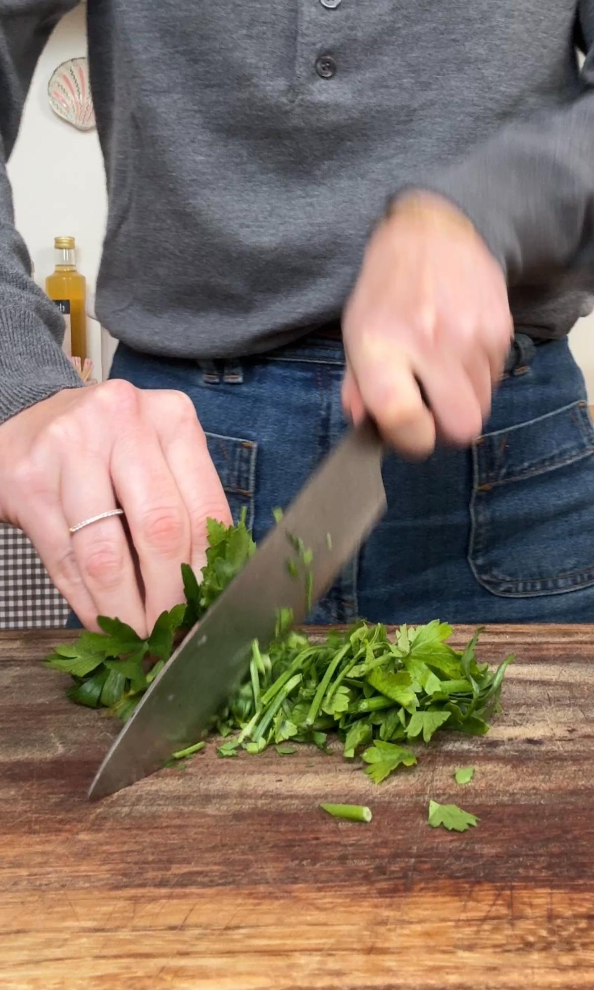 chopping parsley.
