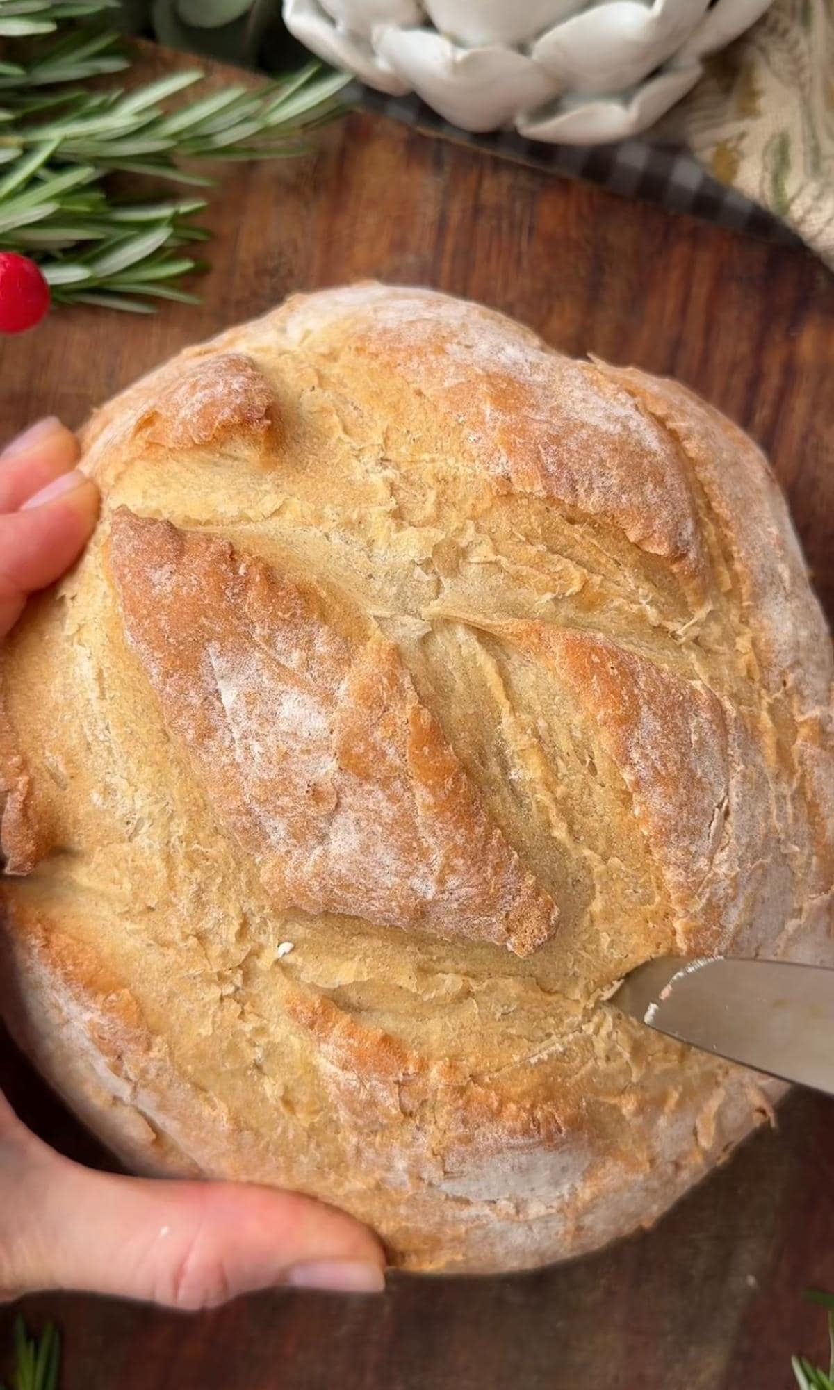 slicing into the cob loaf.