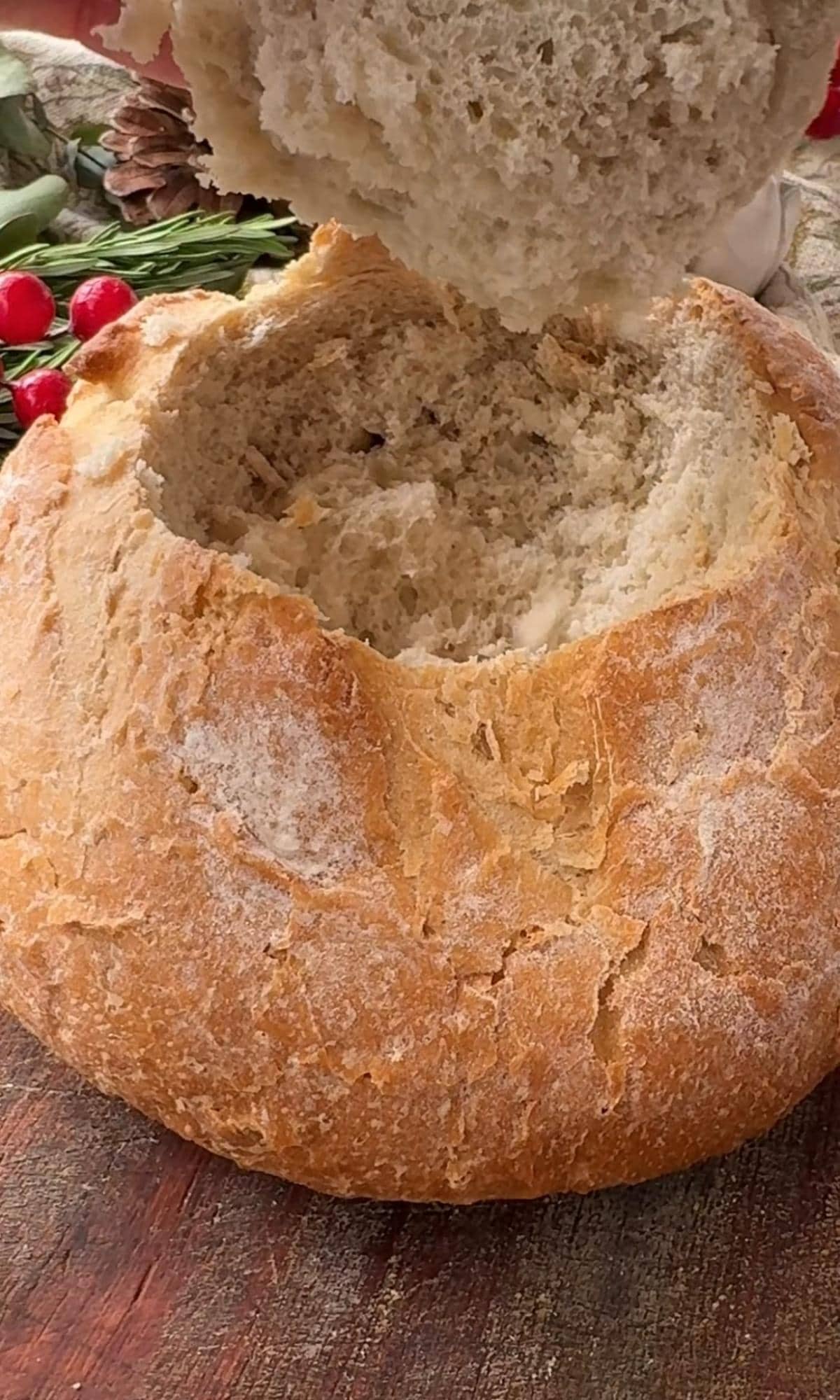 removing the lid of the cob loaf.