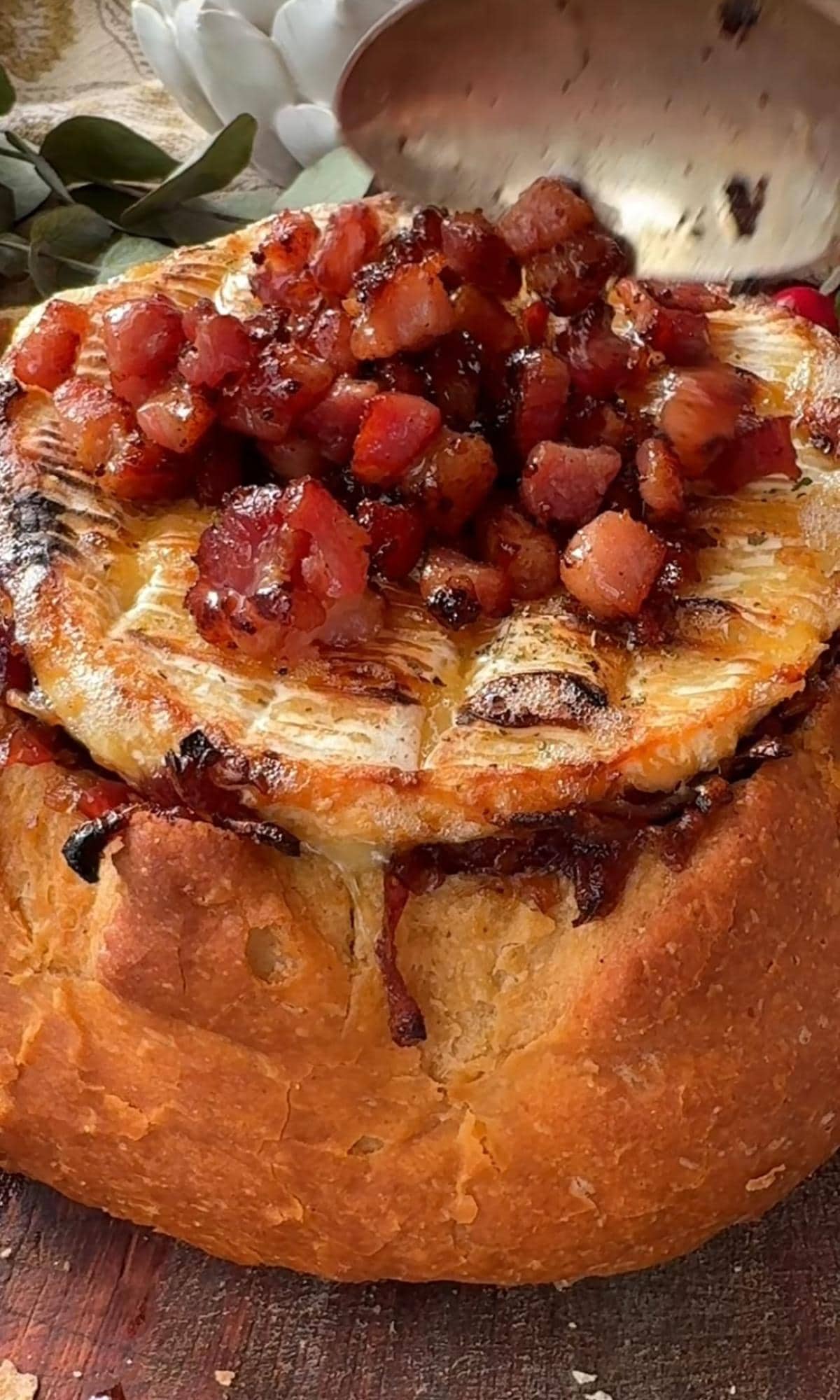 topping camembert roti with crispy pancetta.