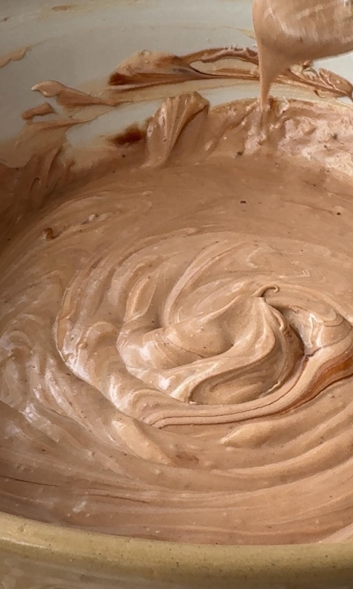 mixing chocolate orange cheesecake mix.