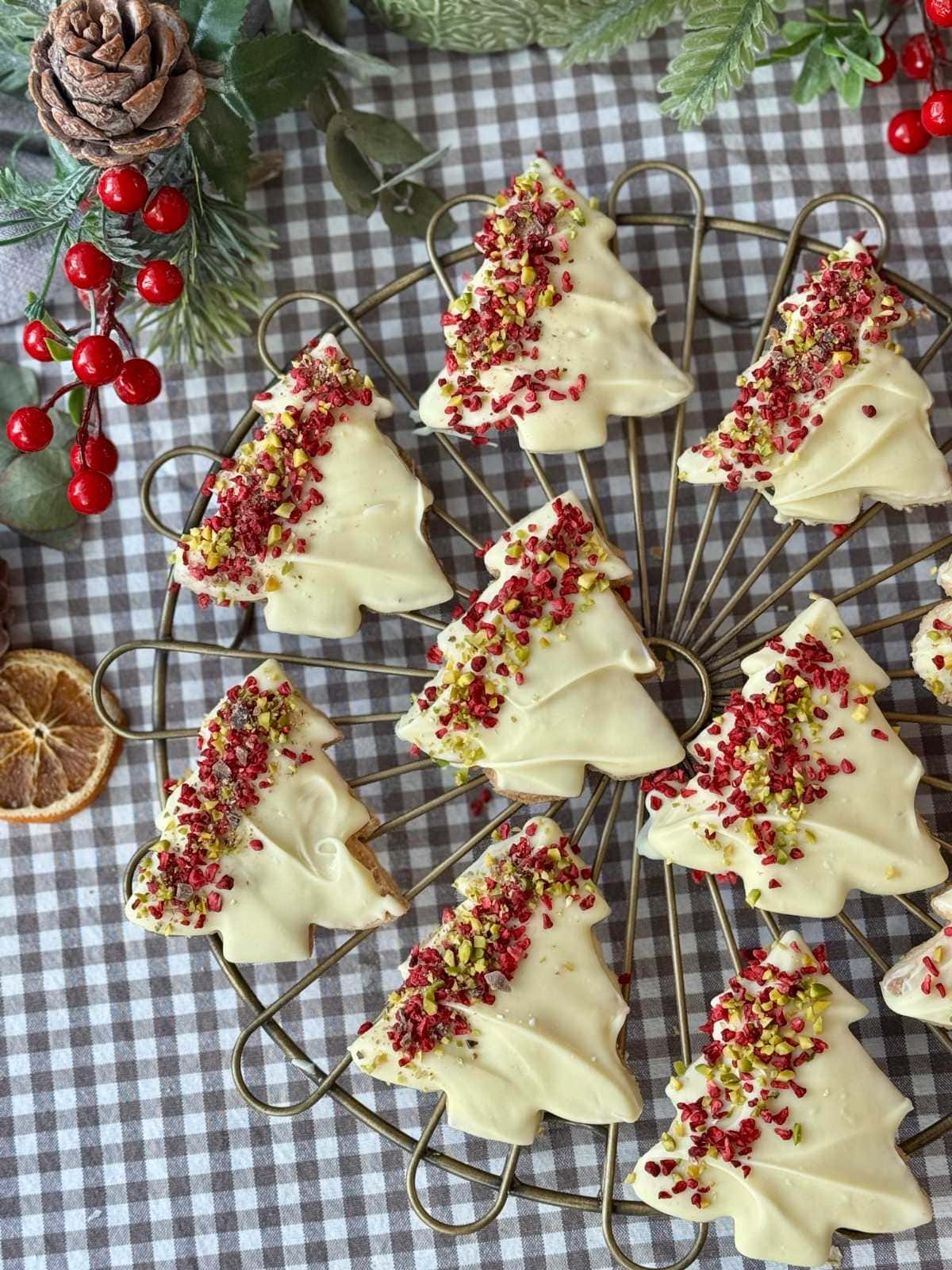 christmas tree cookies on a baking tray.