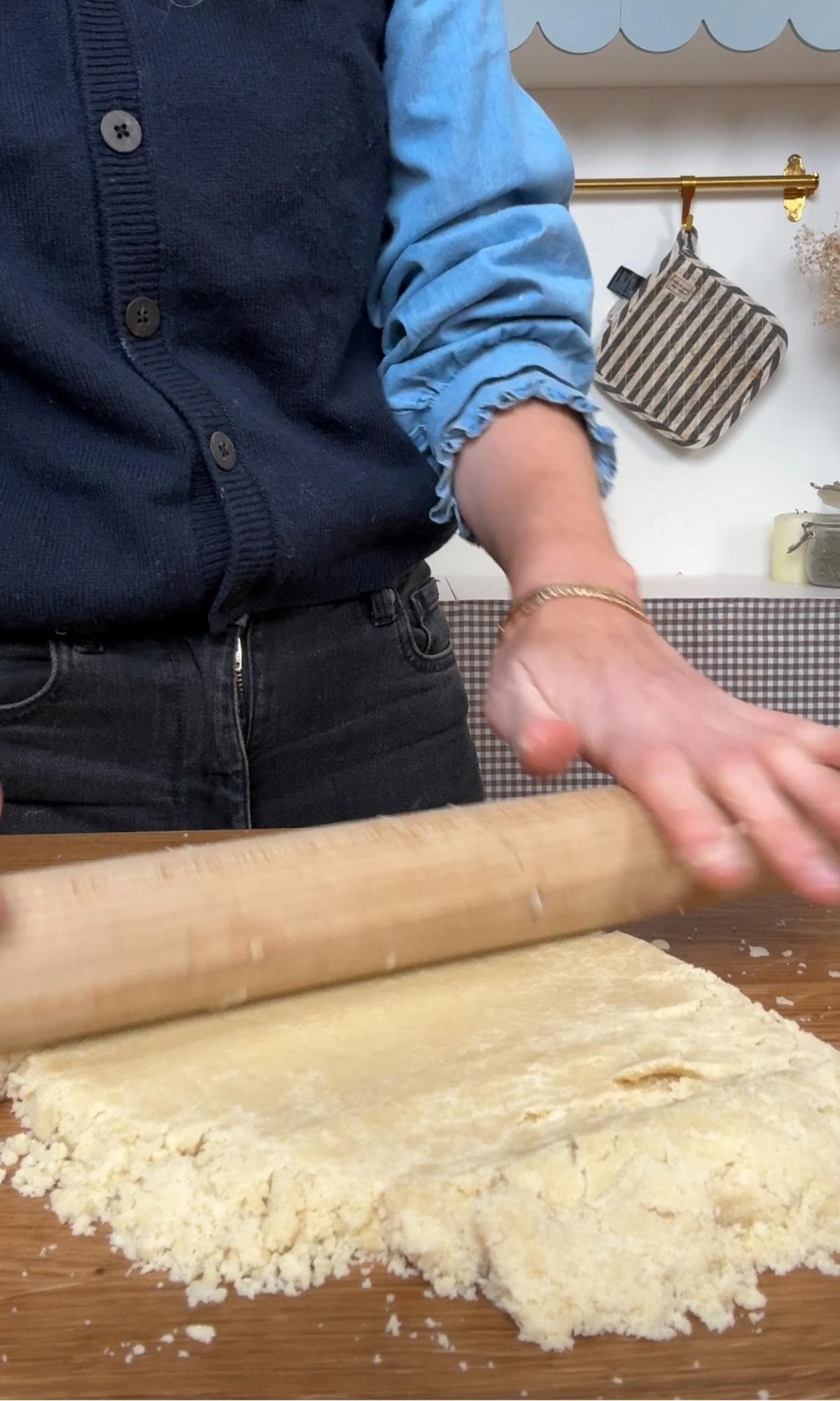 rolling the cookie dough into a sheet.