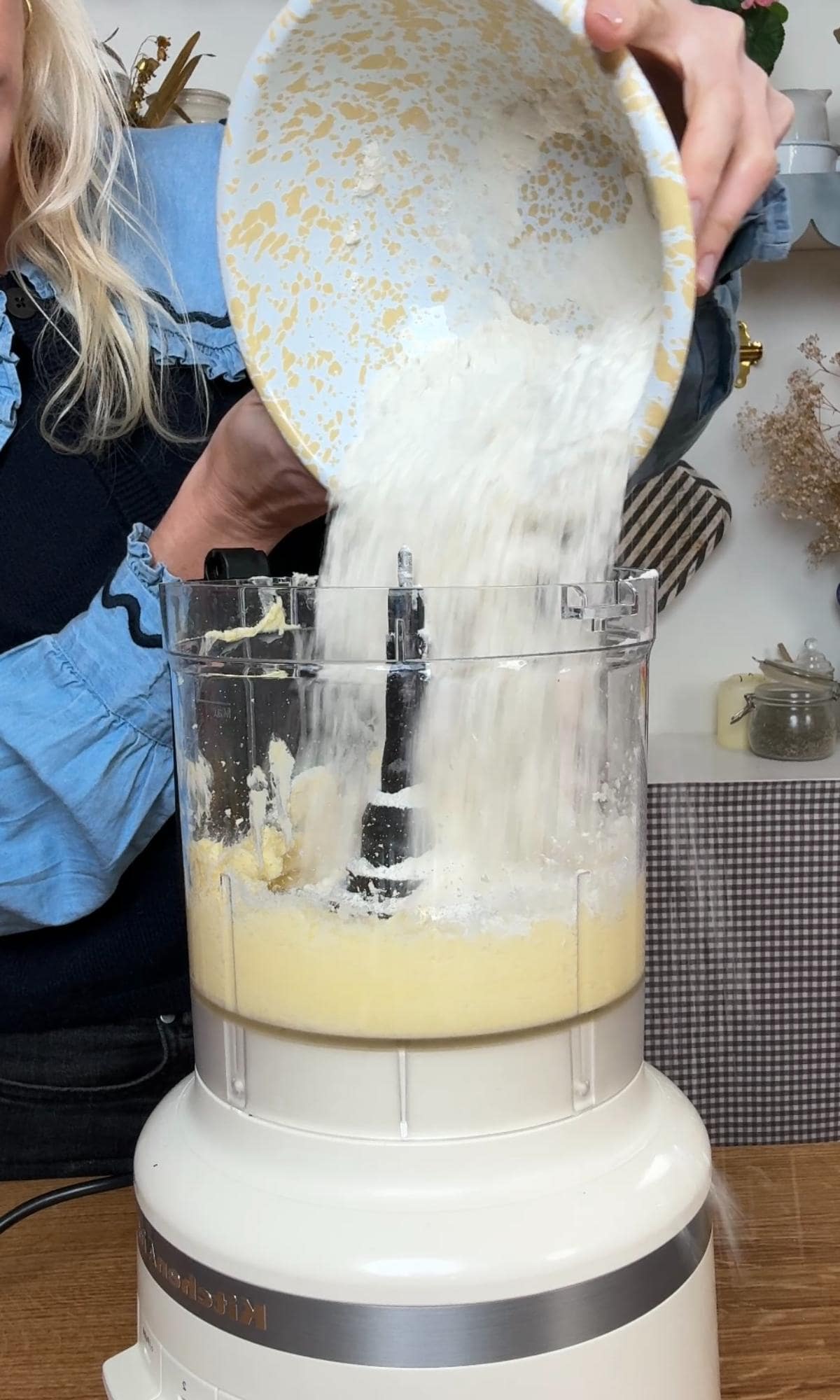 making the christmas tree cookie dough in a food processor.