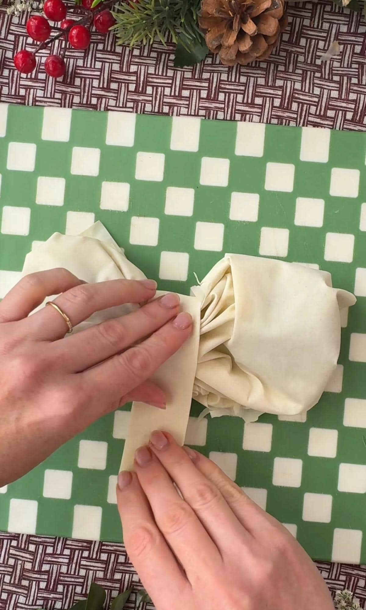 adding the tie to the filo bow.