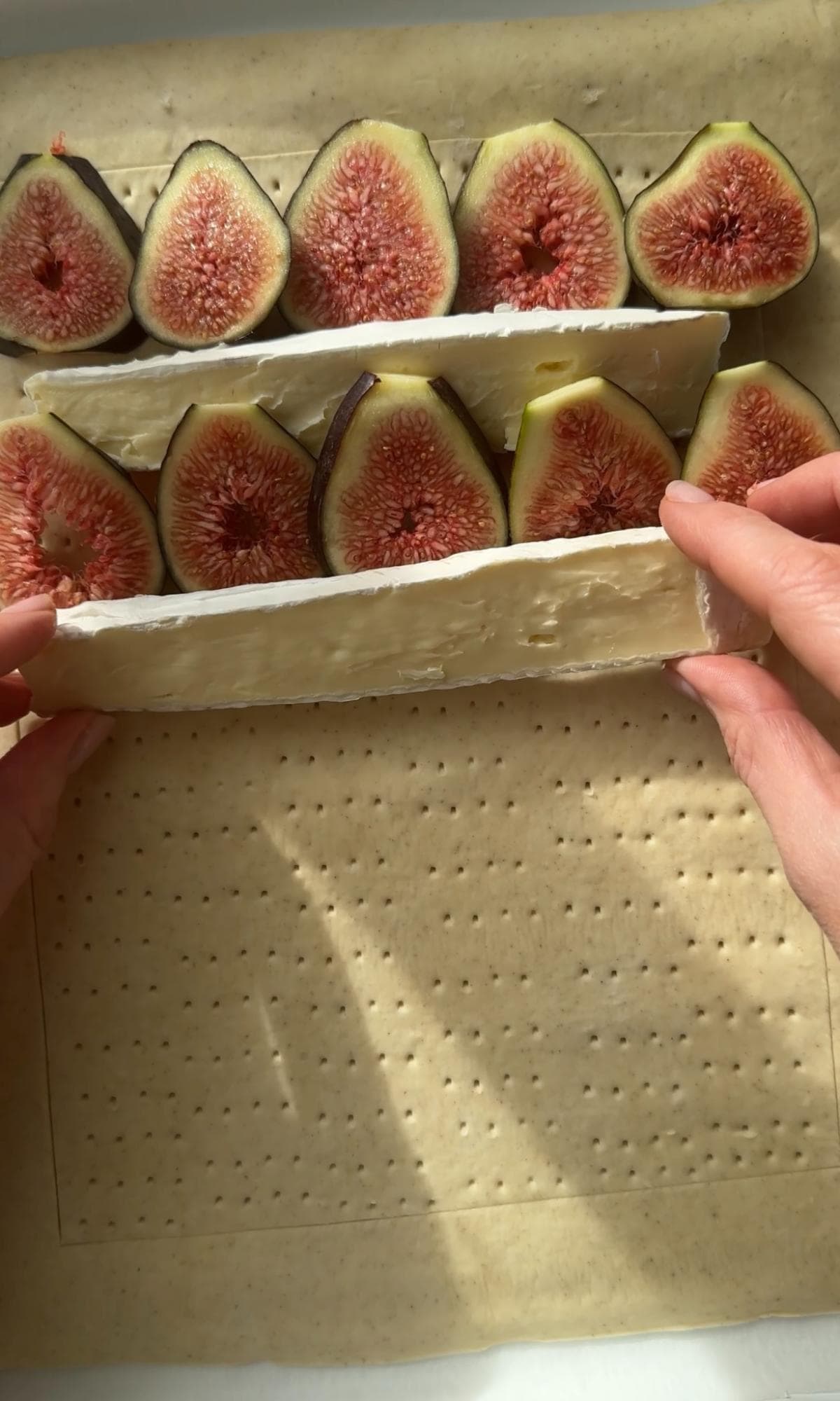 laying brie with the figs.