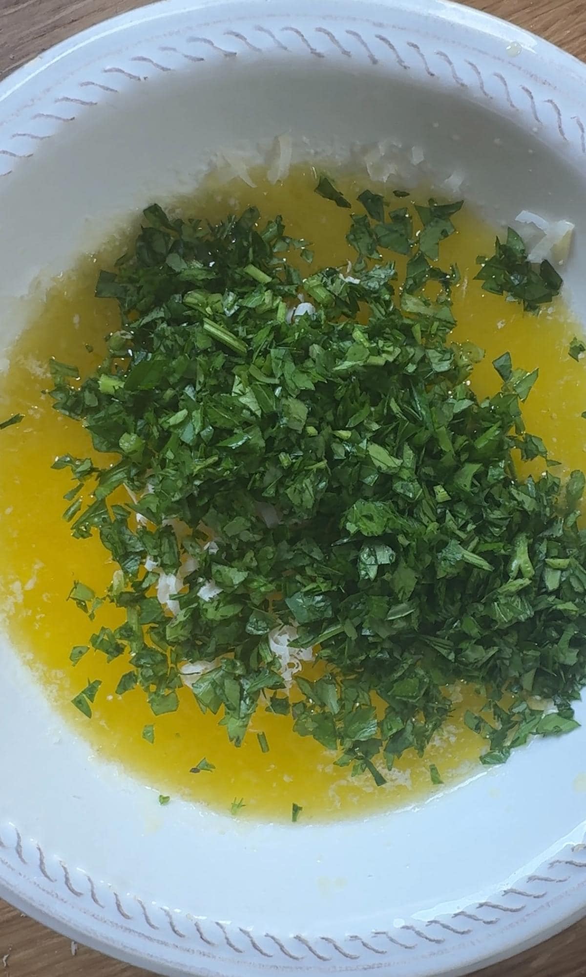 mixing garlic butter.