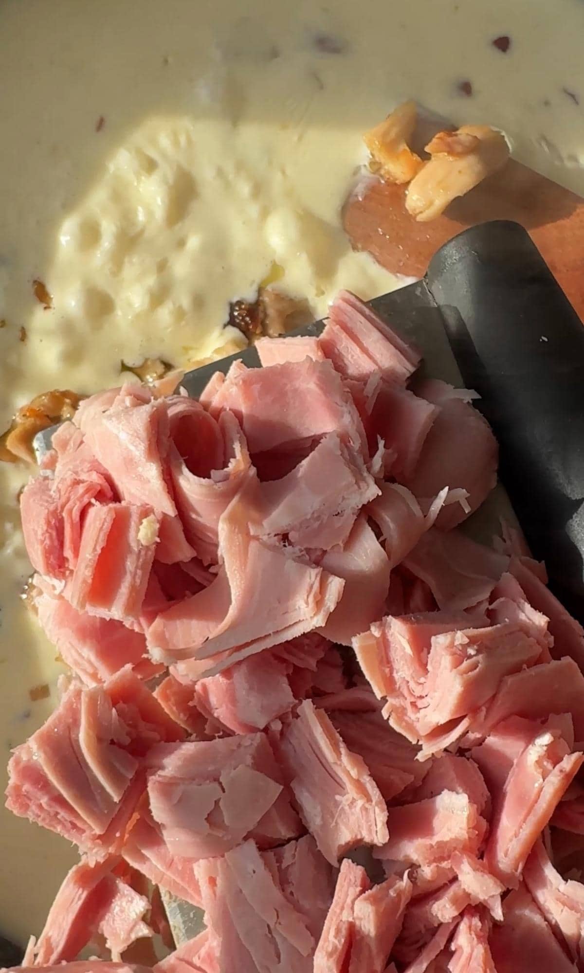 adding ham to the pie.