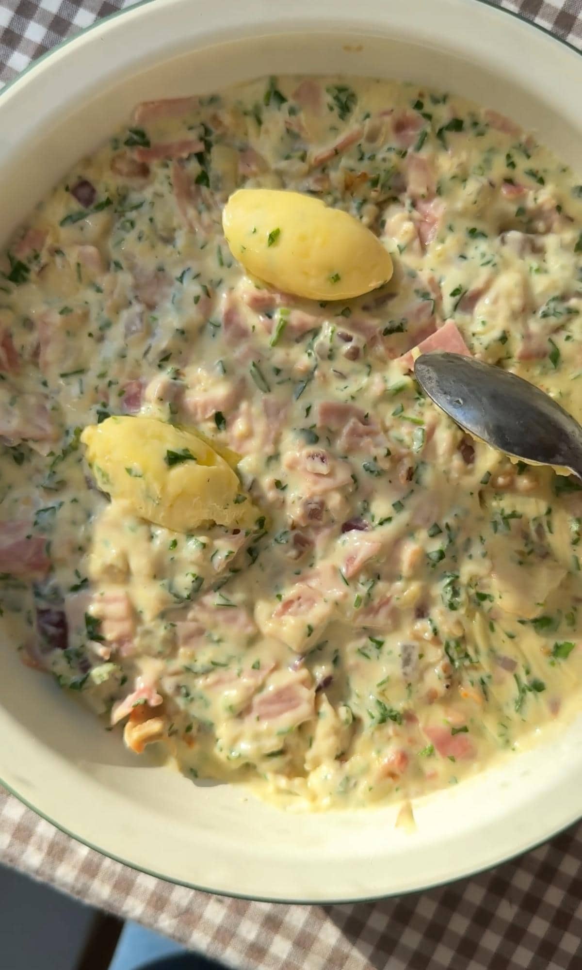 topping turkey ham pie with garlic butter.