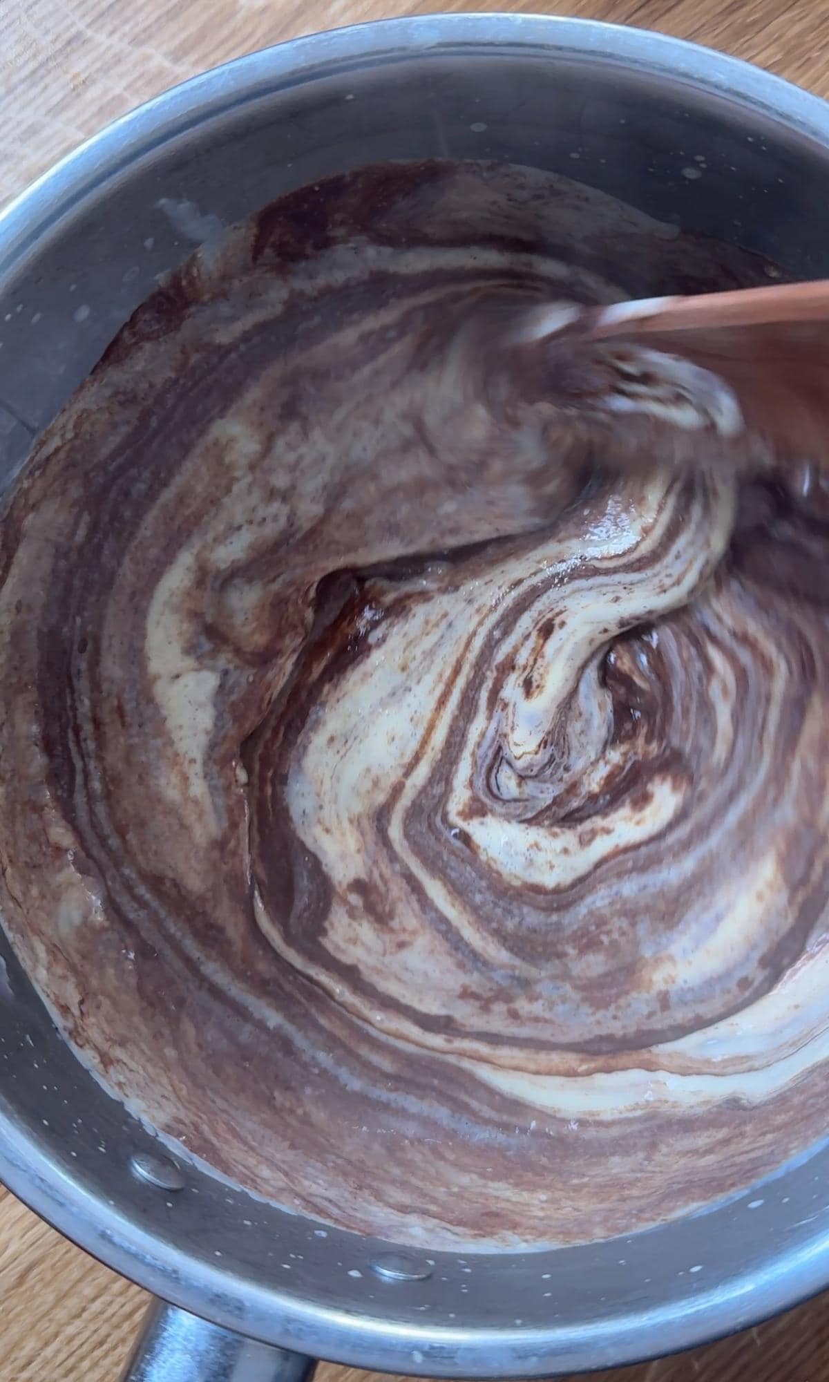 melting chocolate into the budino custard.