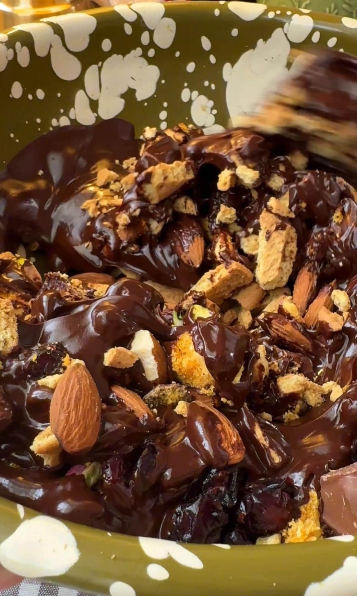 mixing add ins to melted chocolate.