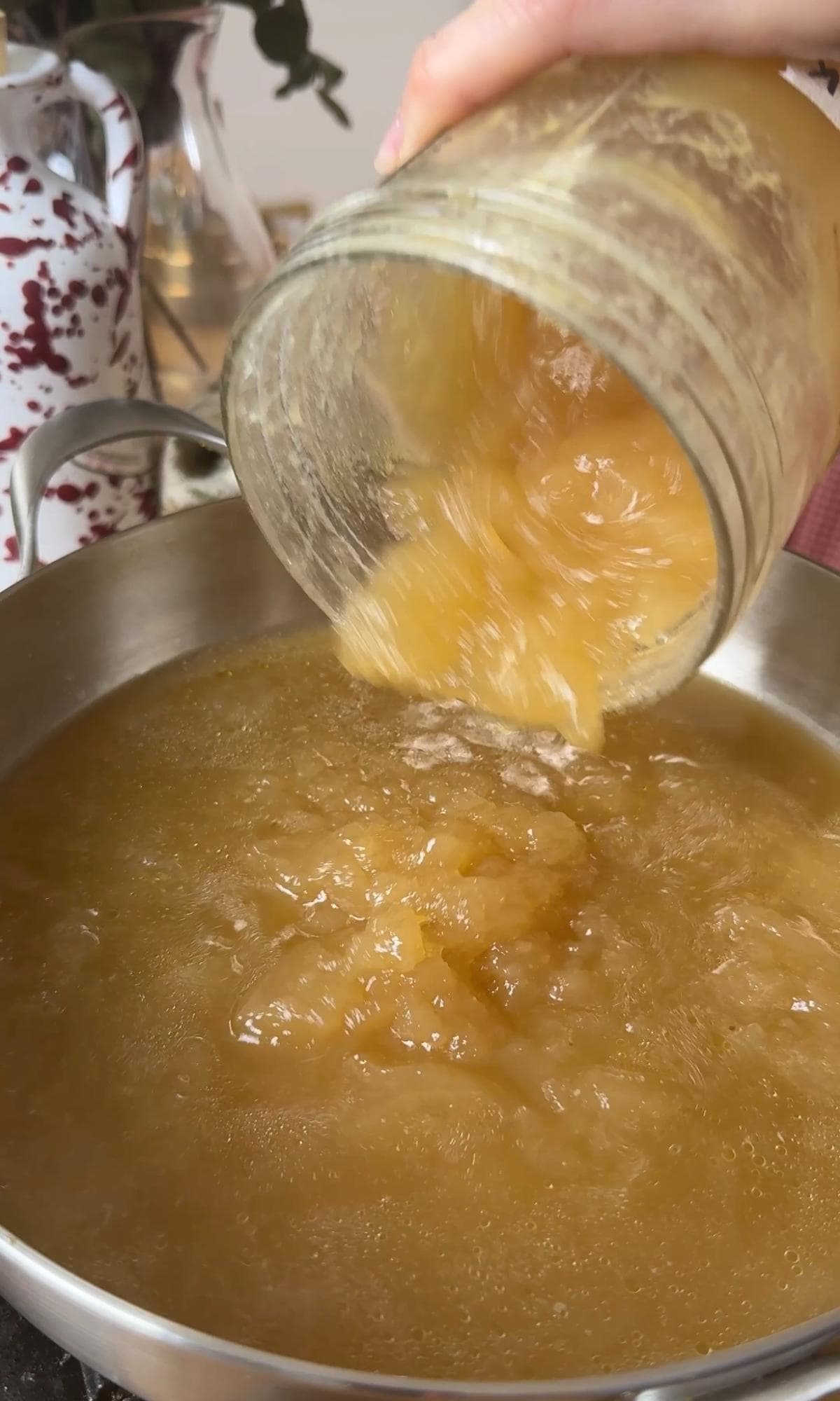 adding chicken stock to pan.
