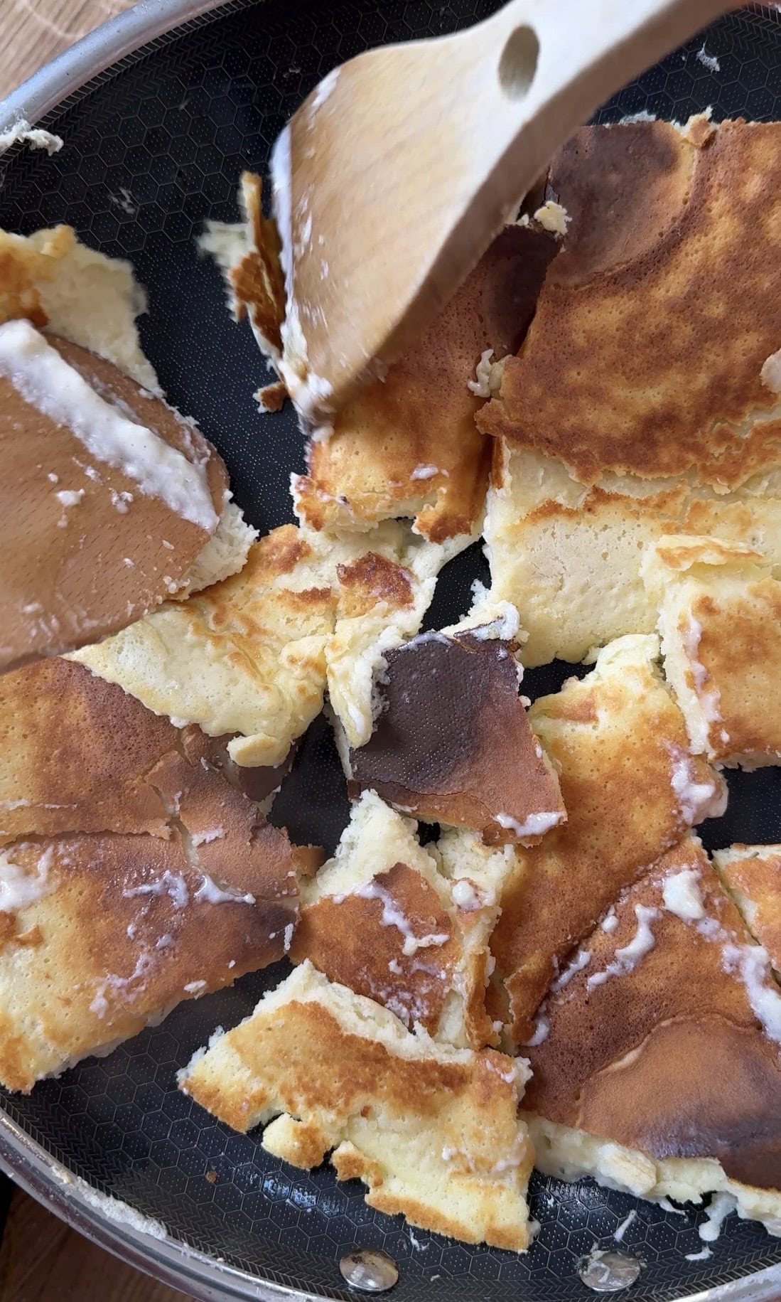 tearing Kaiserschmarrn into pieces.