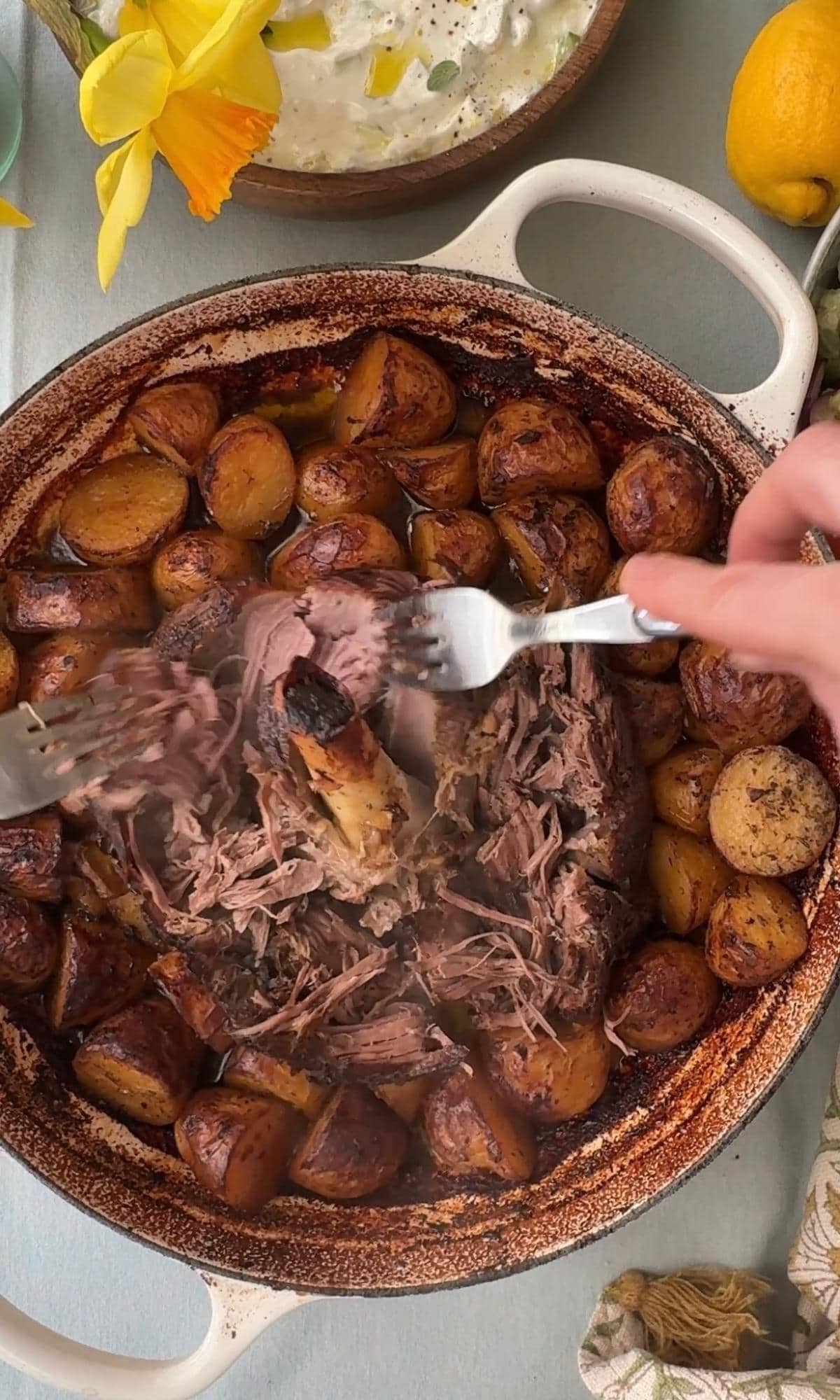 pulling the lamb apart.