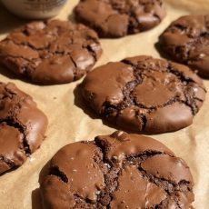 chocolate brownie cookies on brown parchment paper